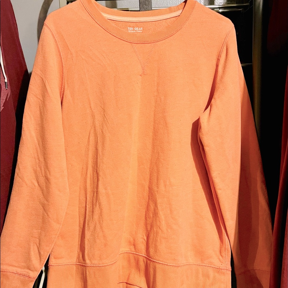 Woman’s XL (runs small) , Tek Gear sweatshirt. Peach in color, lightly worn.